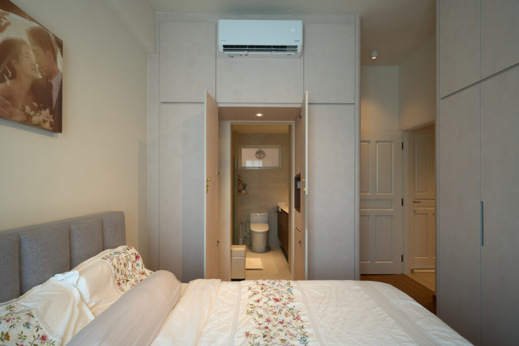 carpentry with hidden bathroom entrance