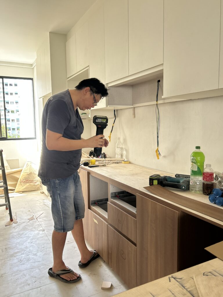 HDB carpentry in singapore, work in progress, installing countertop