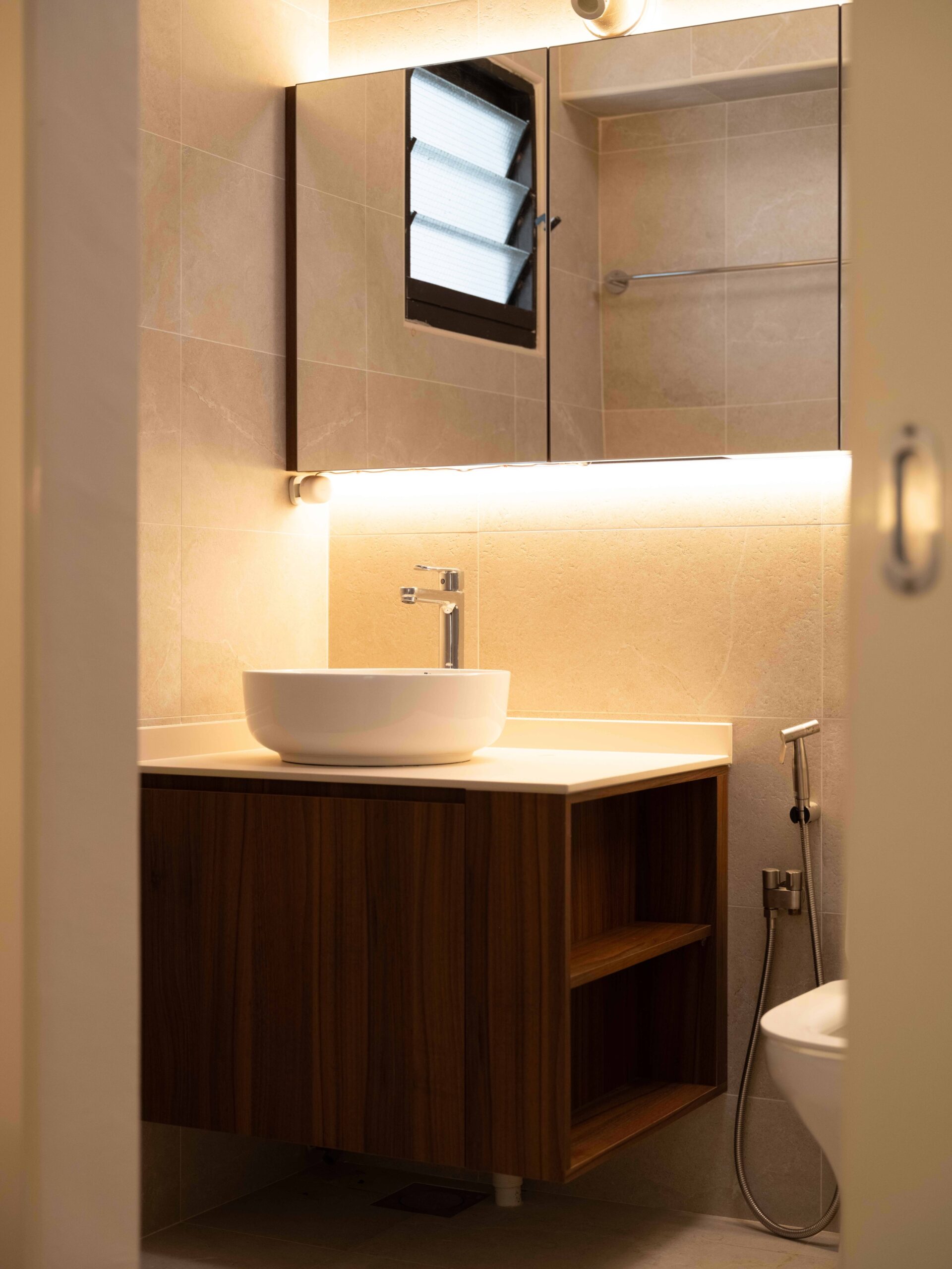 floating bathroom vanity with built in lighting above