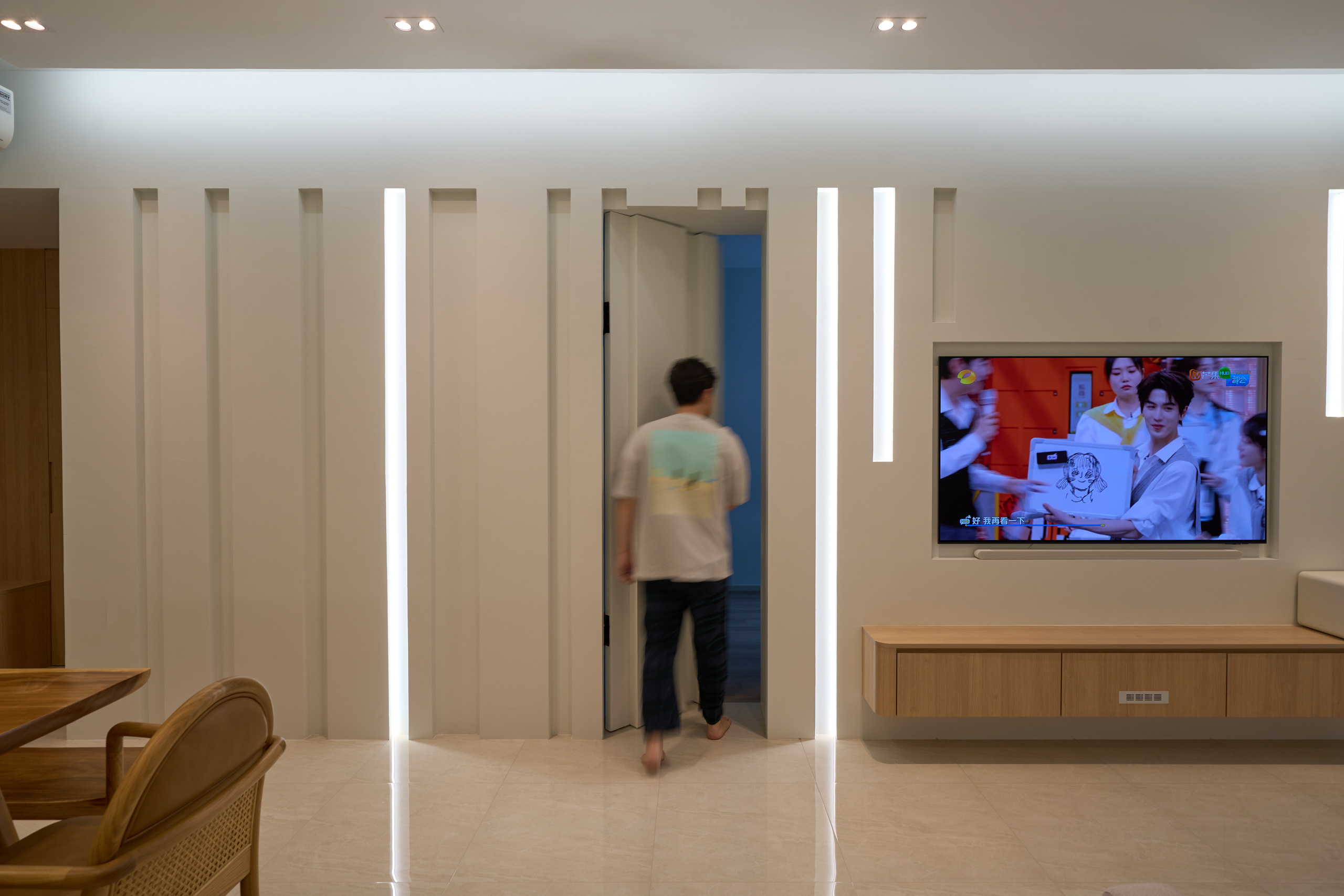 fluted feature wall in living room, condo carpentry